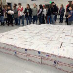 Stacked care packages going to to deployed servicemen and women