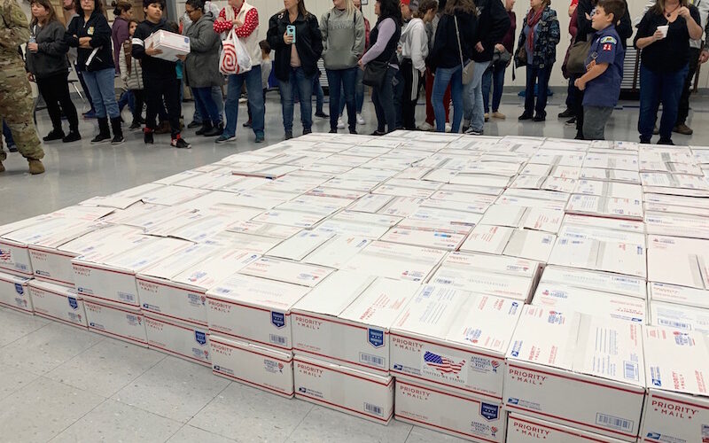 Stacked care packages going to to deployed servicemen and women
