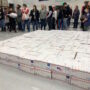 Stacked care packages going to to deployed servicemen and women