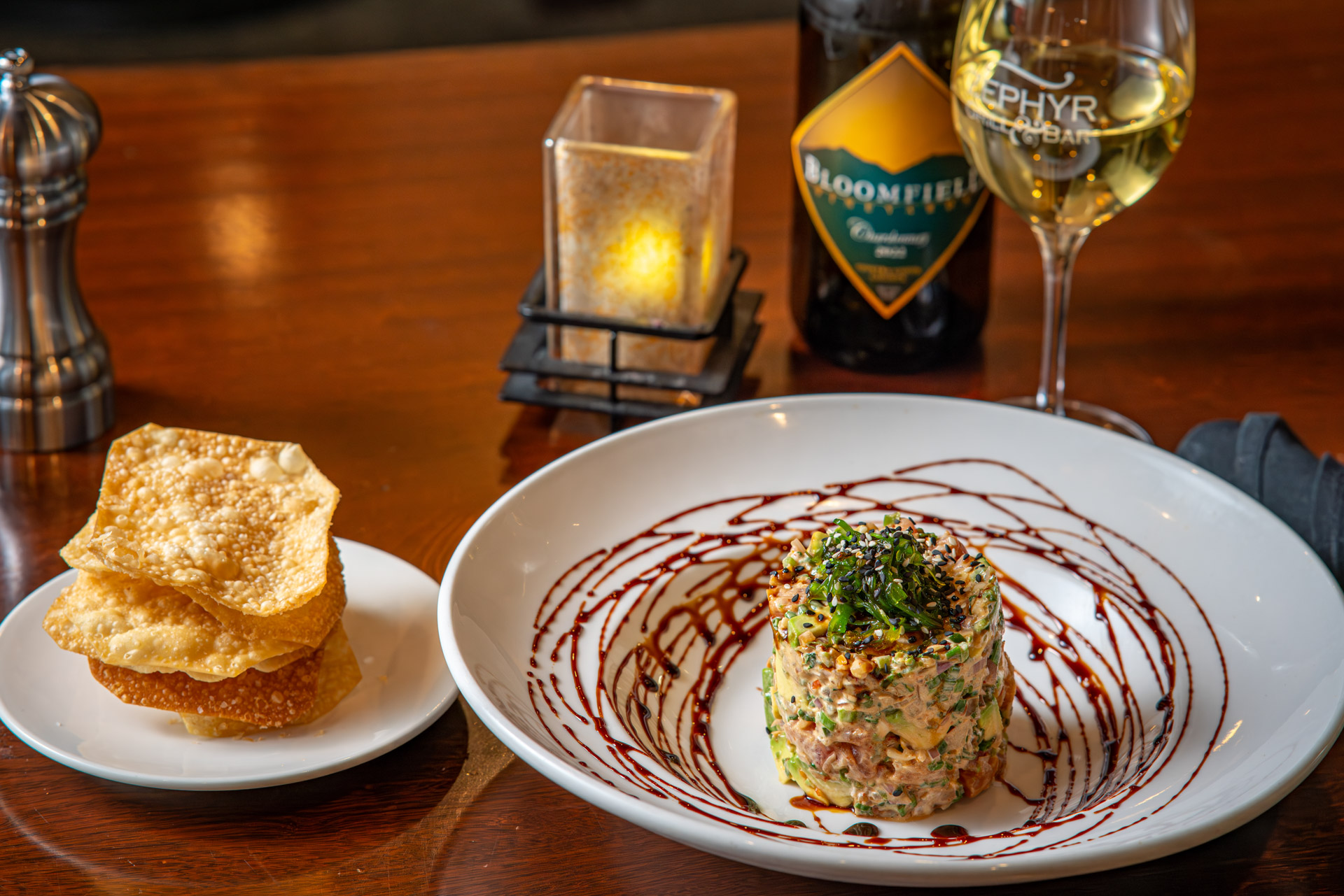 Zephyr Wonton chips with crab tower and wine