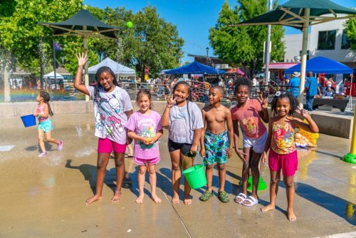 2025 Brentwood Juneteenth celebration - kids enjoying water feature at park