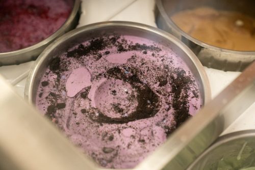Ice cream in tubs ready to be scooped 