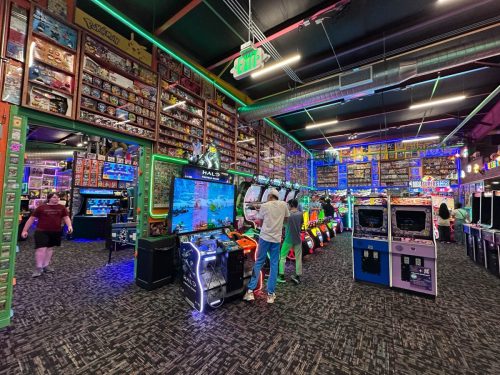 Next Level Pinball Museum - various arcade and pinball machines decorated with different video game memorabilia
