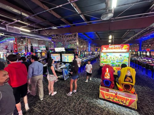 Next Level Pinball Museum - various arcade and pinball machines decorated with different video game memorabilia