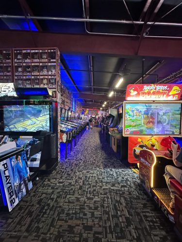 Next Level Pinball Museum - various arcade and pinball machines decorated with different video game memorabilia